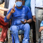 Person with disability in the bus using wheelchair 4